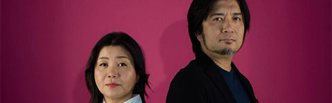   Nobuko Toda and Kazuma Jinnouchi standing back to back