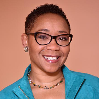 Karen Bell smiling.