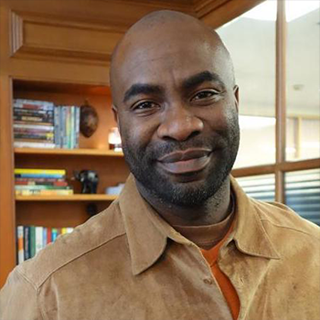 Sean Skeete smiling.