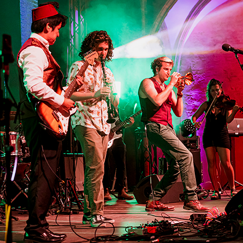 Students performing on stage