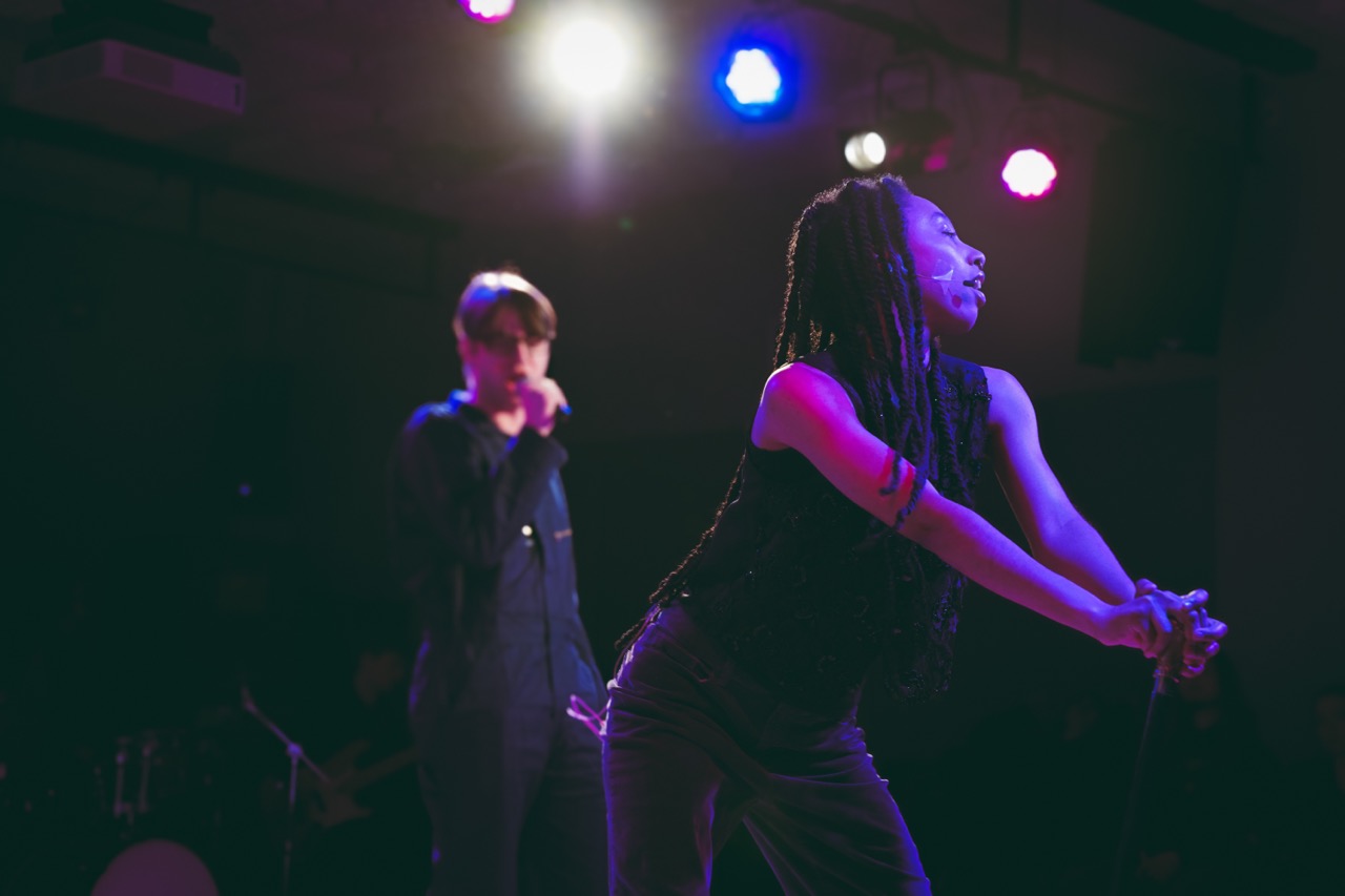two dancers on stage