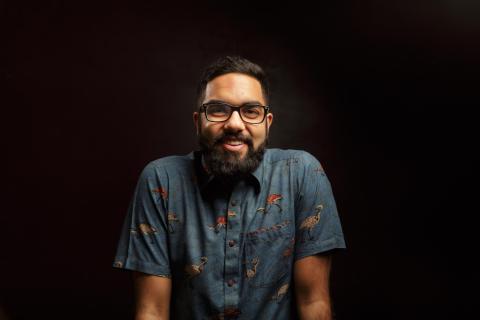 man in a blue shirt